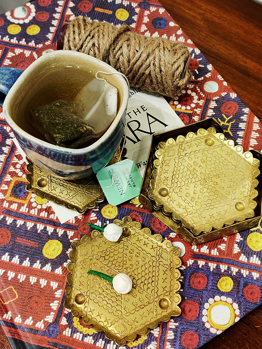 Upcycled brass tea coster set